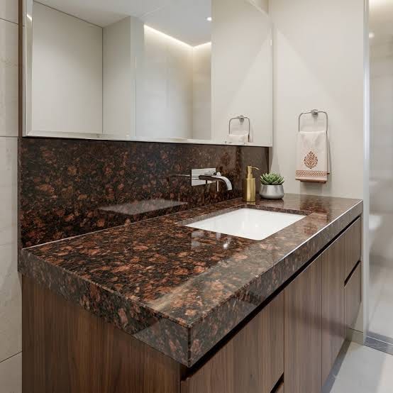 Brown granite vanity top in a bathroom